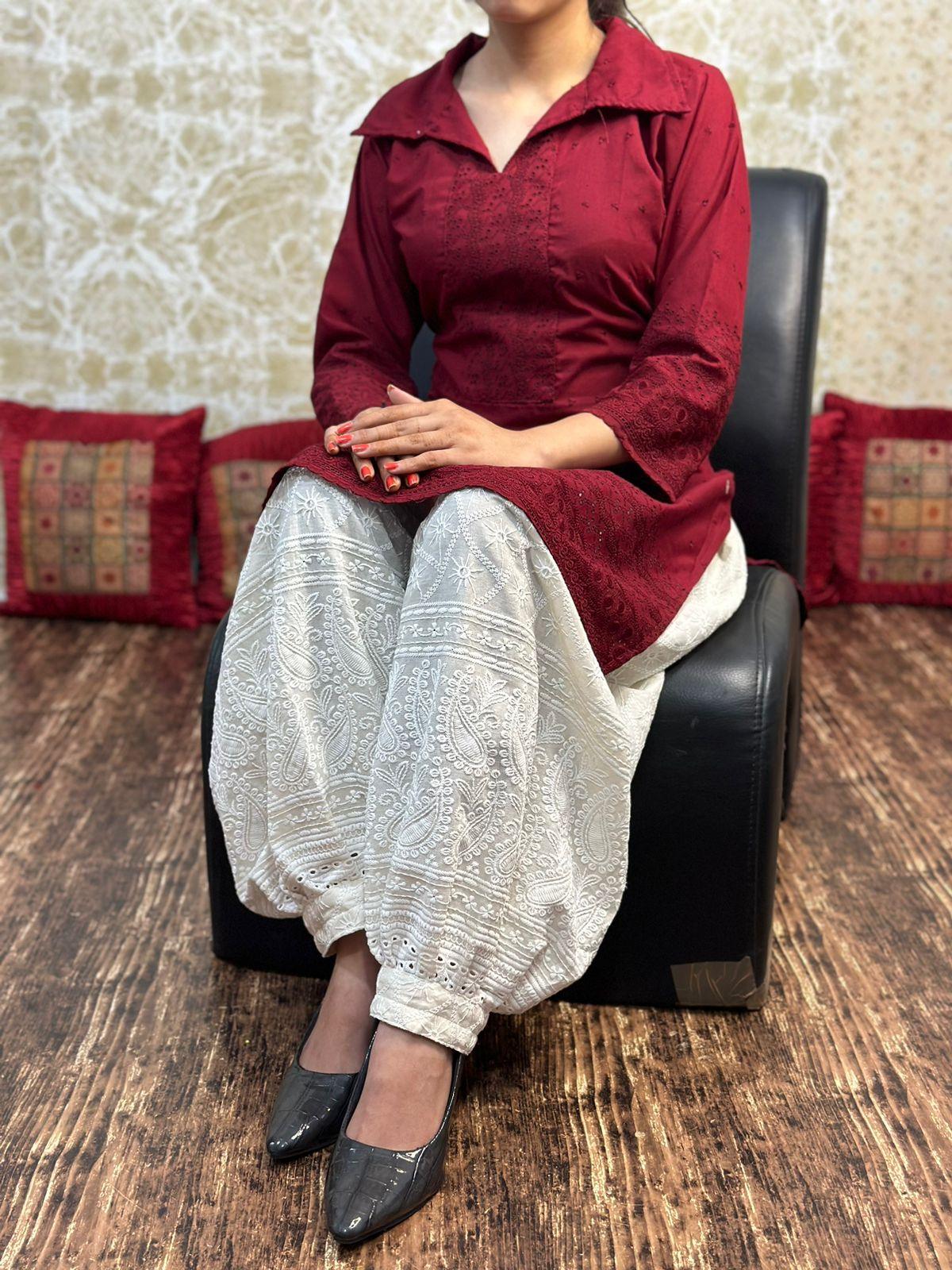 Maroon color Collar neck chikankari kurta teamed up with chikankari Afghani salwar - Inayakhan Shop