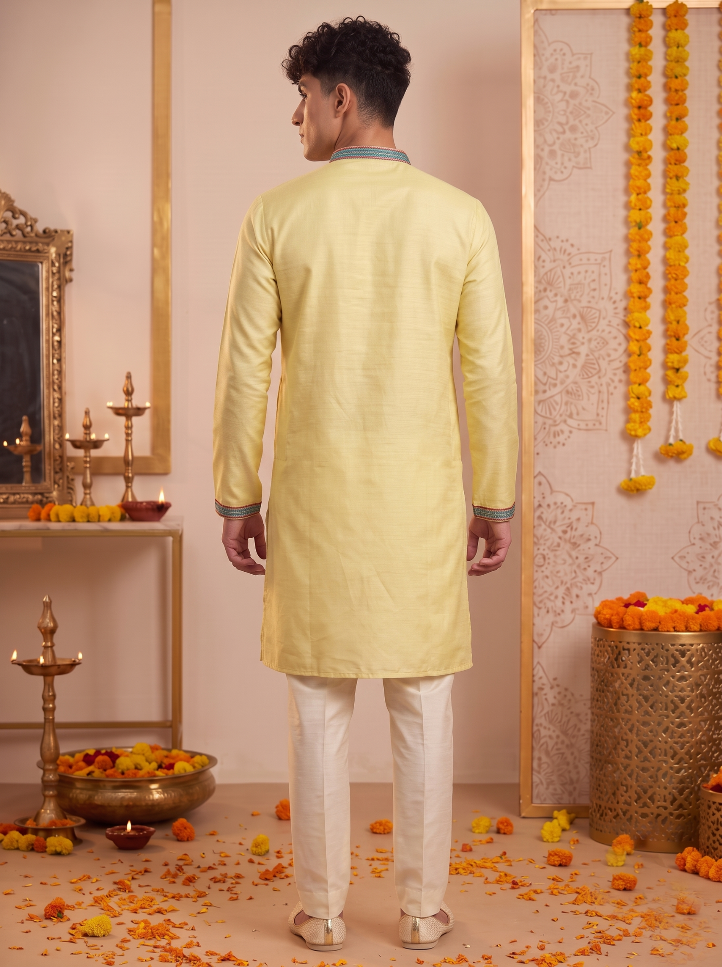 Men's lemon yellow silk kurta and ivory trouser set back view