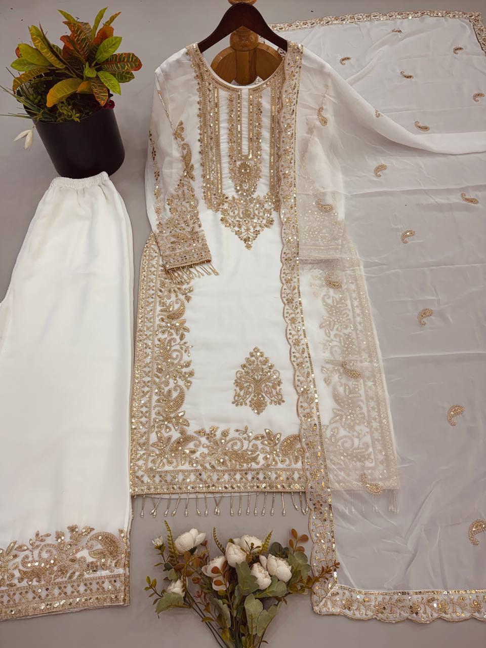 White faux georgette embroidered sequin top palazzo dupatta set flat lay