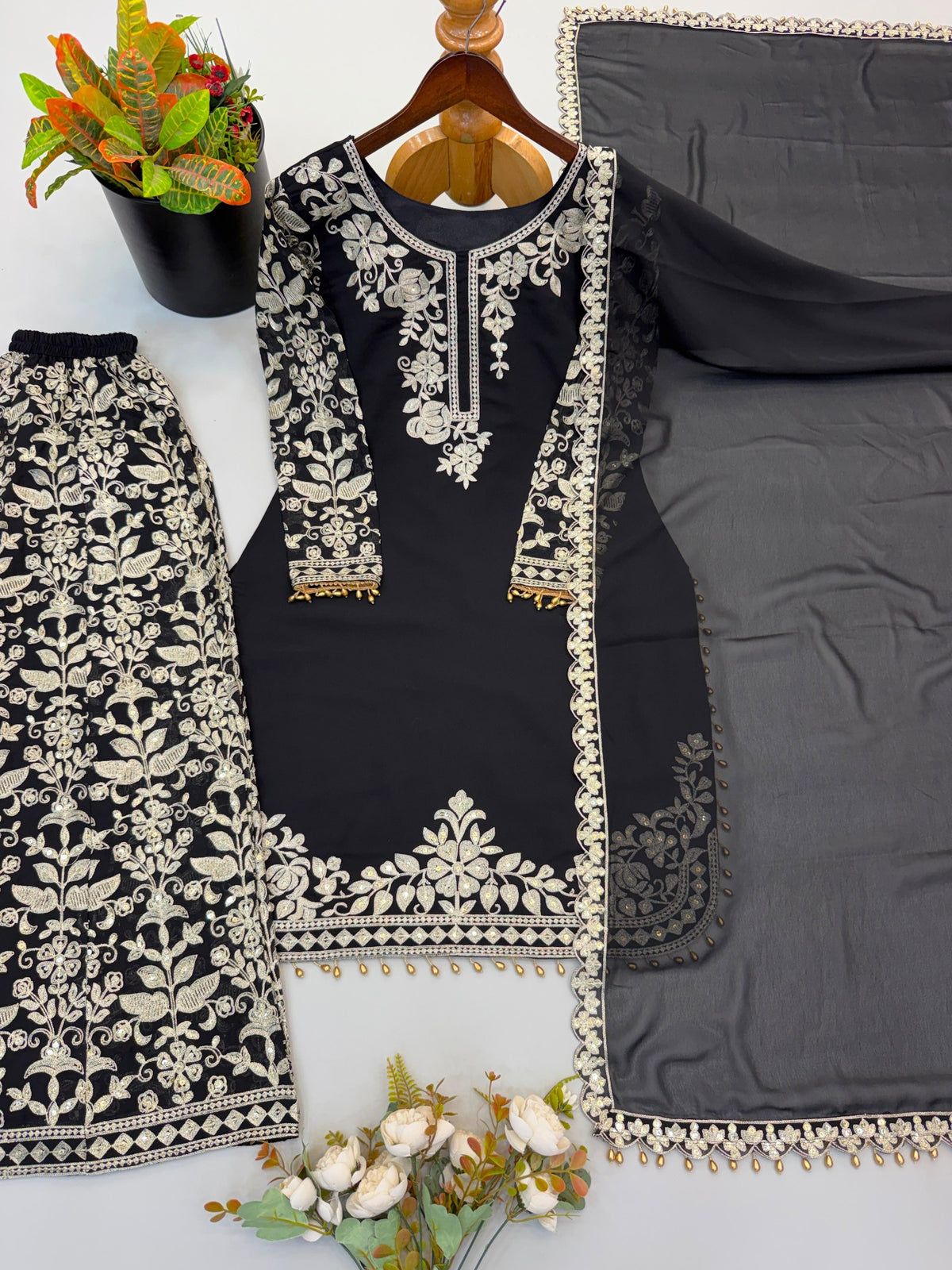 Black faux georgette embroidered sequence work set flat lay