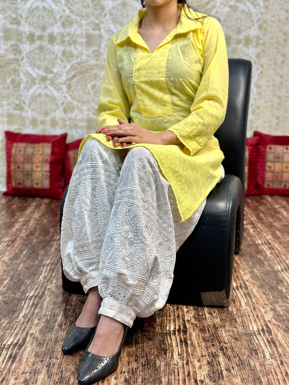 Yellow color Collar neck chikankari kurta teamed up with chikankari Afghani salwar - Inayakhan Shop