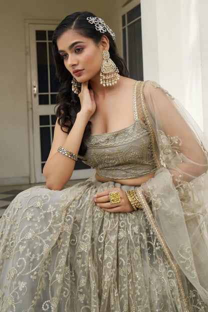 Ivory A-Line Net Bridesmaid Lehenga Choli with Resham and Sequins Work