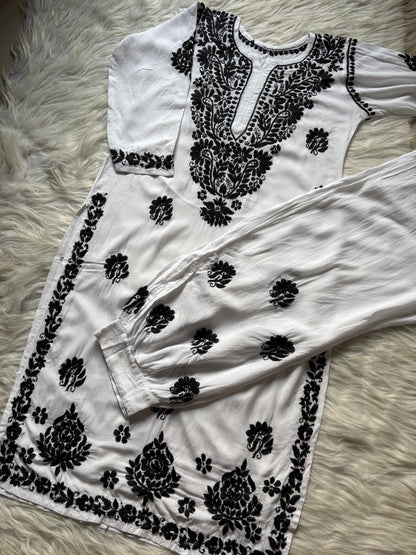 White black hand embroidered Lucknow Chikankari rayon kurta and shalwar set flatlay