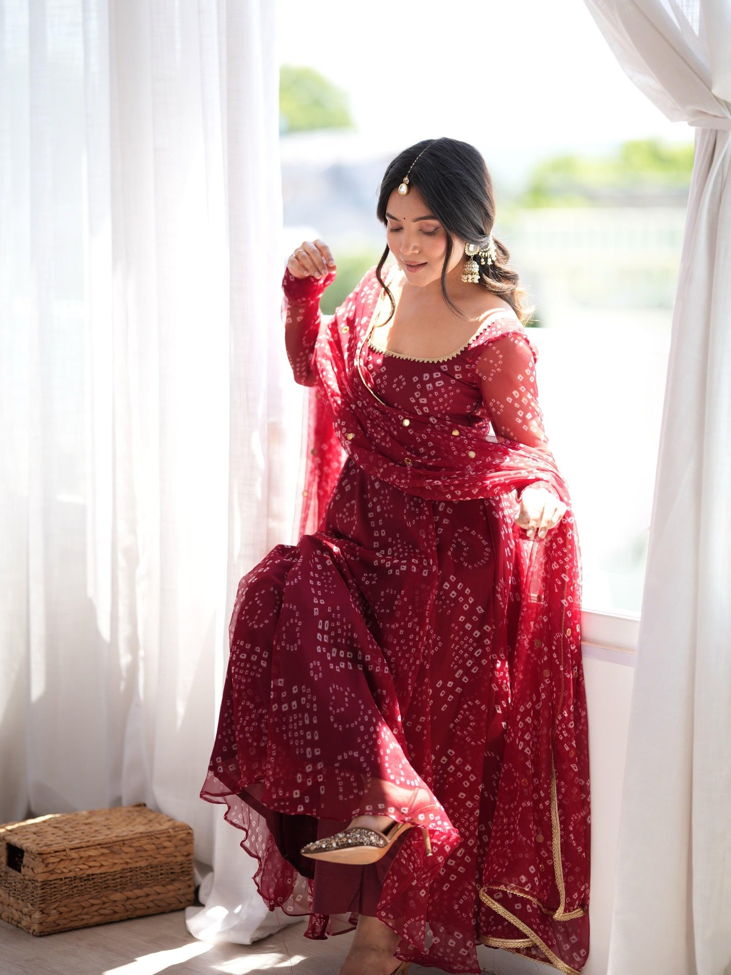 Red faux georgette gown seated styling view