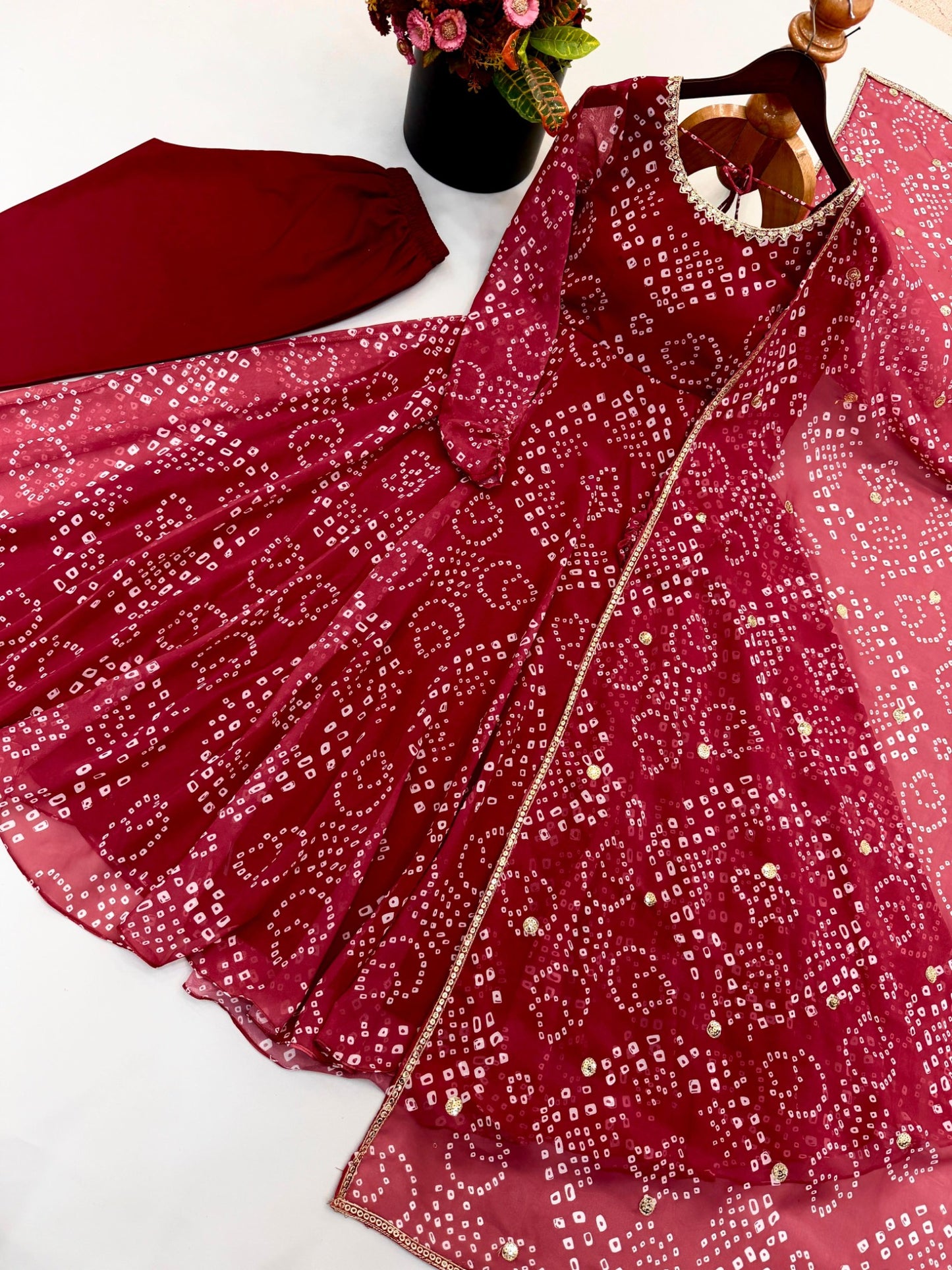 Red faux georgette gown pant and dupatta set flat lay