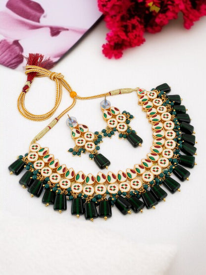 Green and gold imitation jewellery necklace set with earrings