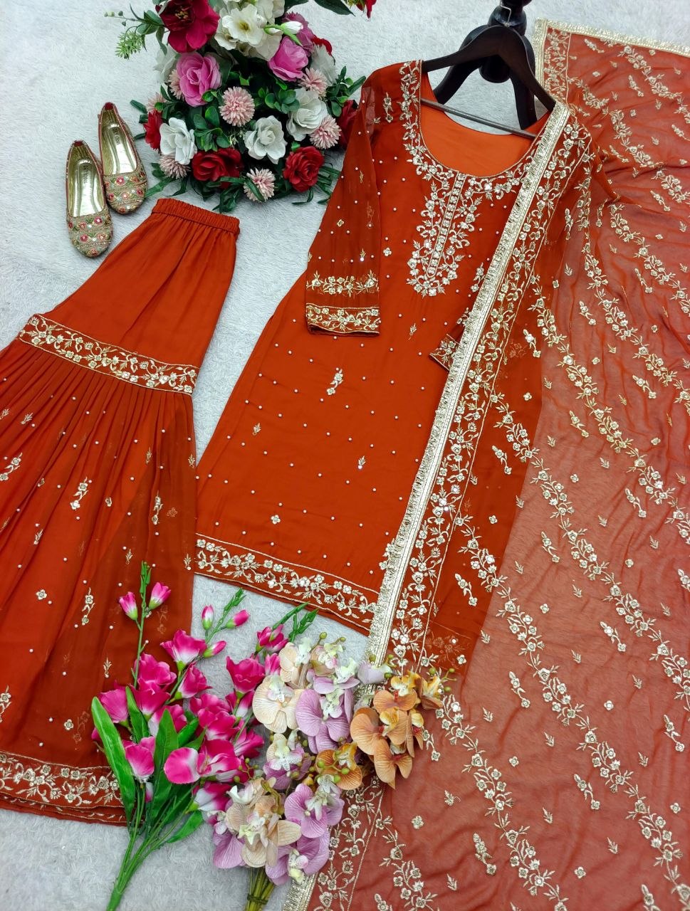 Designer Burnt Orange Sharara Suit – Rivet Moti & Sequence Embellished Ensemble
