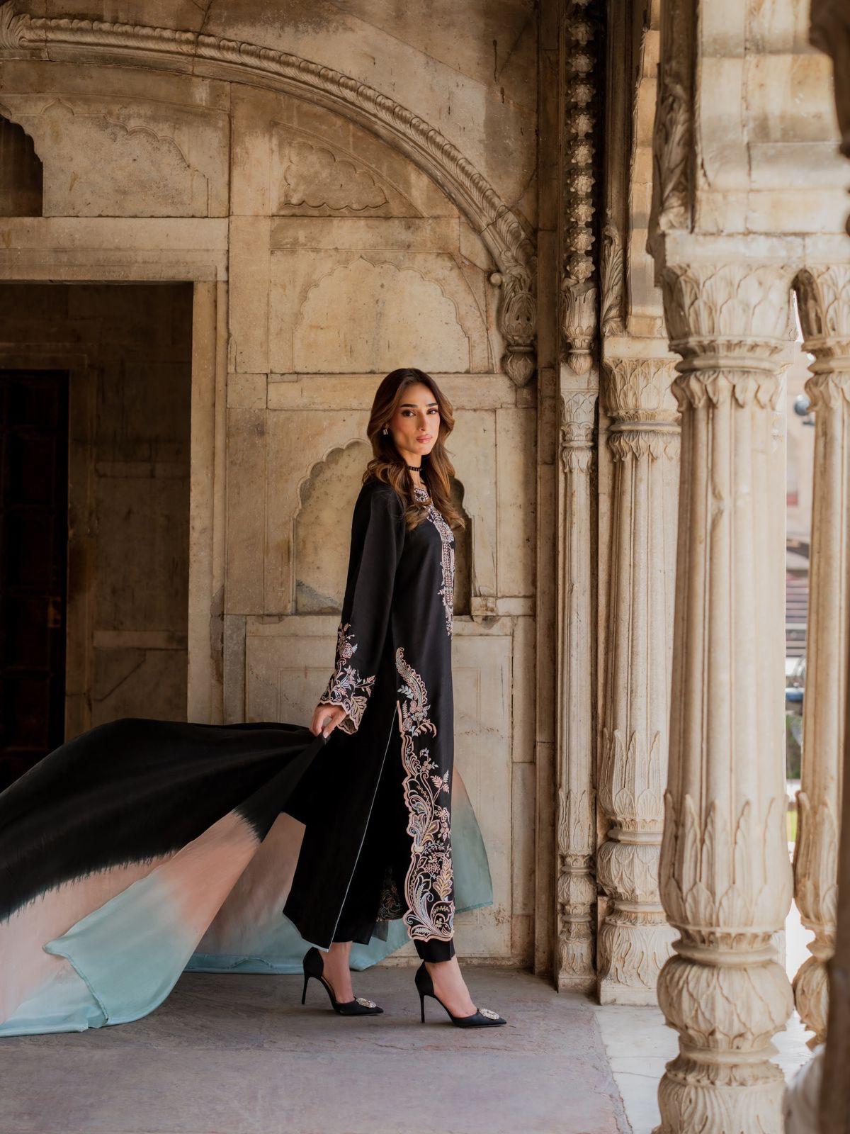 Black embroidered kaftan party wear side lifestyle with shaded dupatta