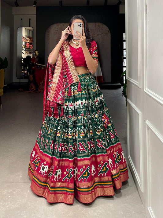 Green Elegant Tussar Silk Navratri Garba Chaniya Choli with Patola Print