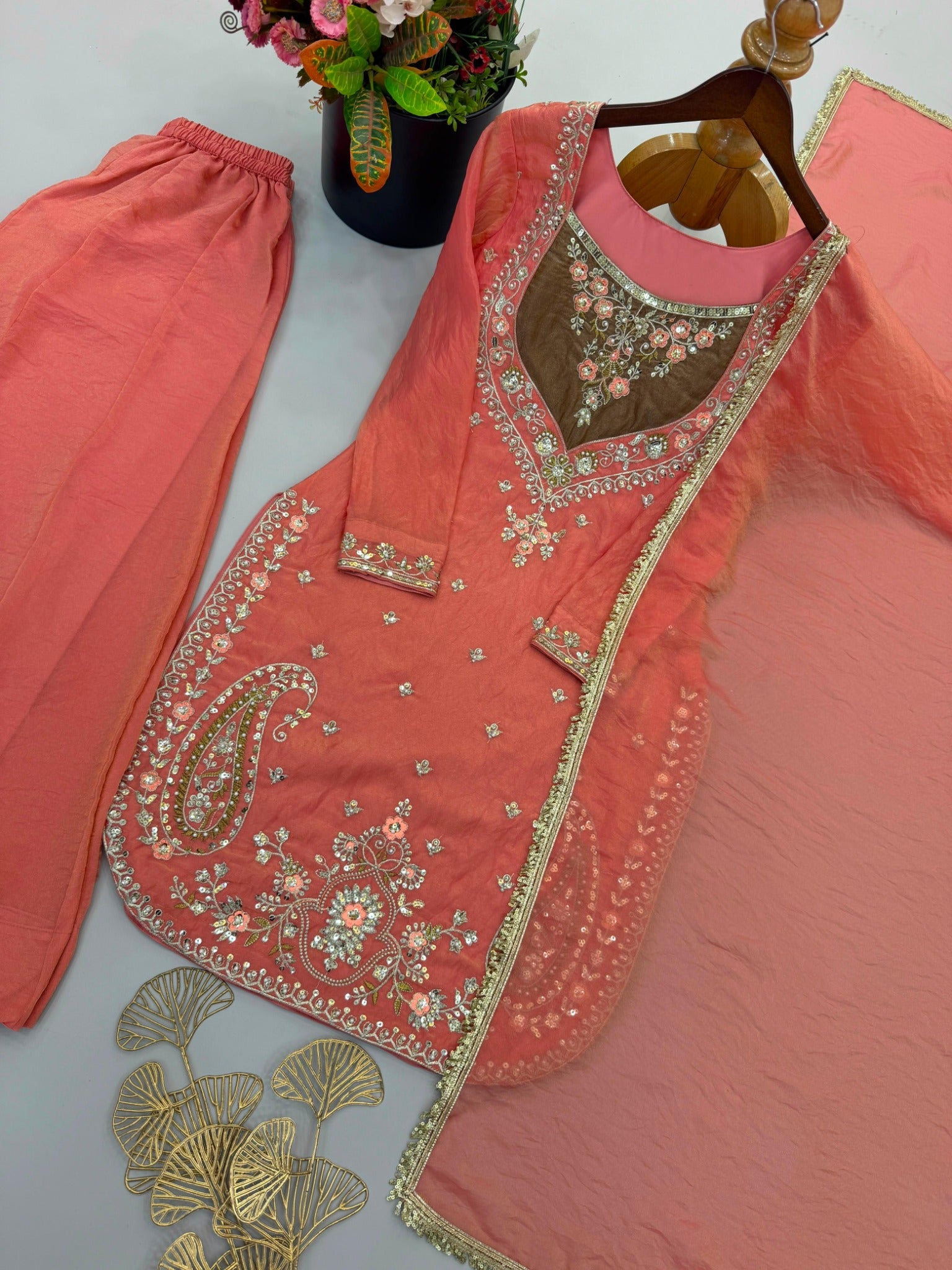 Coral peach NC Moss embroidered palazzo suit set flat lay