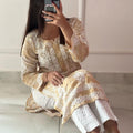 Elegant Simplicity: Yellow Chikankari Kurti in Mulmul Cotton