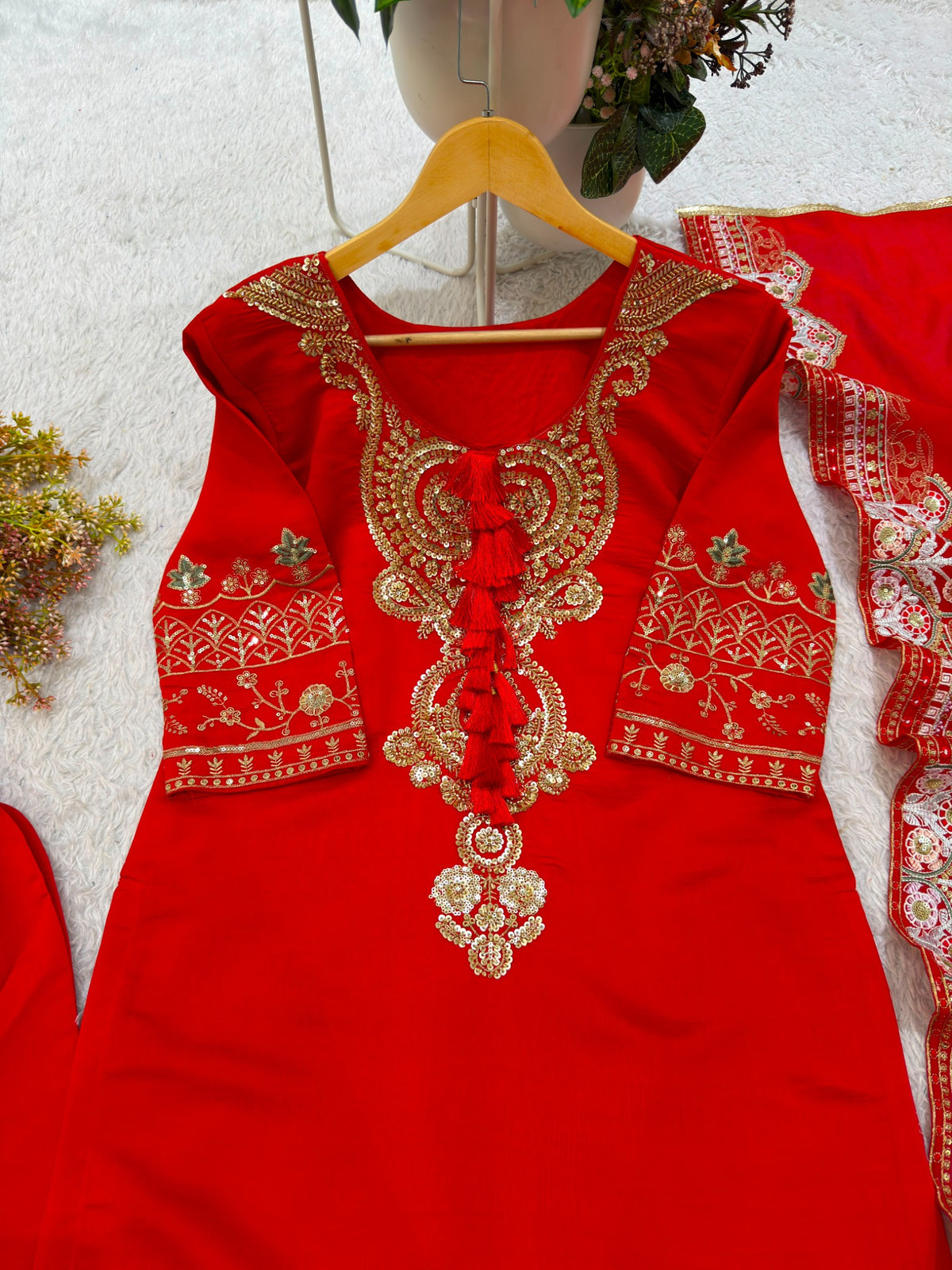 Festive red Roman kurti with heavy beadwork and embroidery
