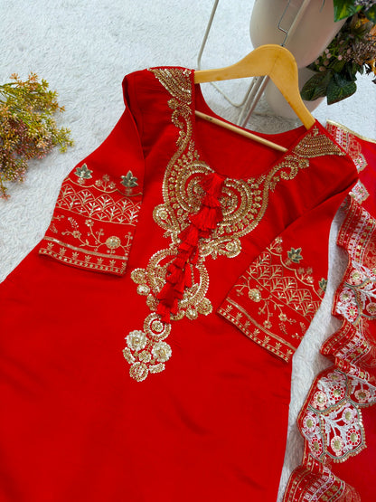 Festive red Roman suit sleeve and neckline embroidery detail