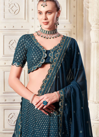 Crystal Teal Blue Glamorous Georgette Lehenga Choli with Embroidery and Sequins