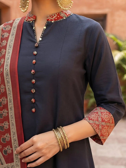 Black cotton Jaipuri Anarkali kurta pants set with maroon Bagru print dupatta - neck detail view | InayaKhan