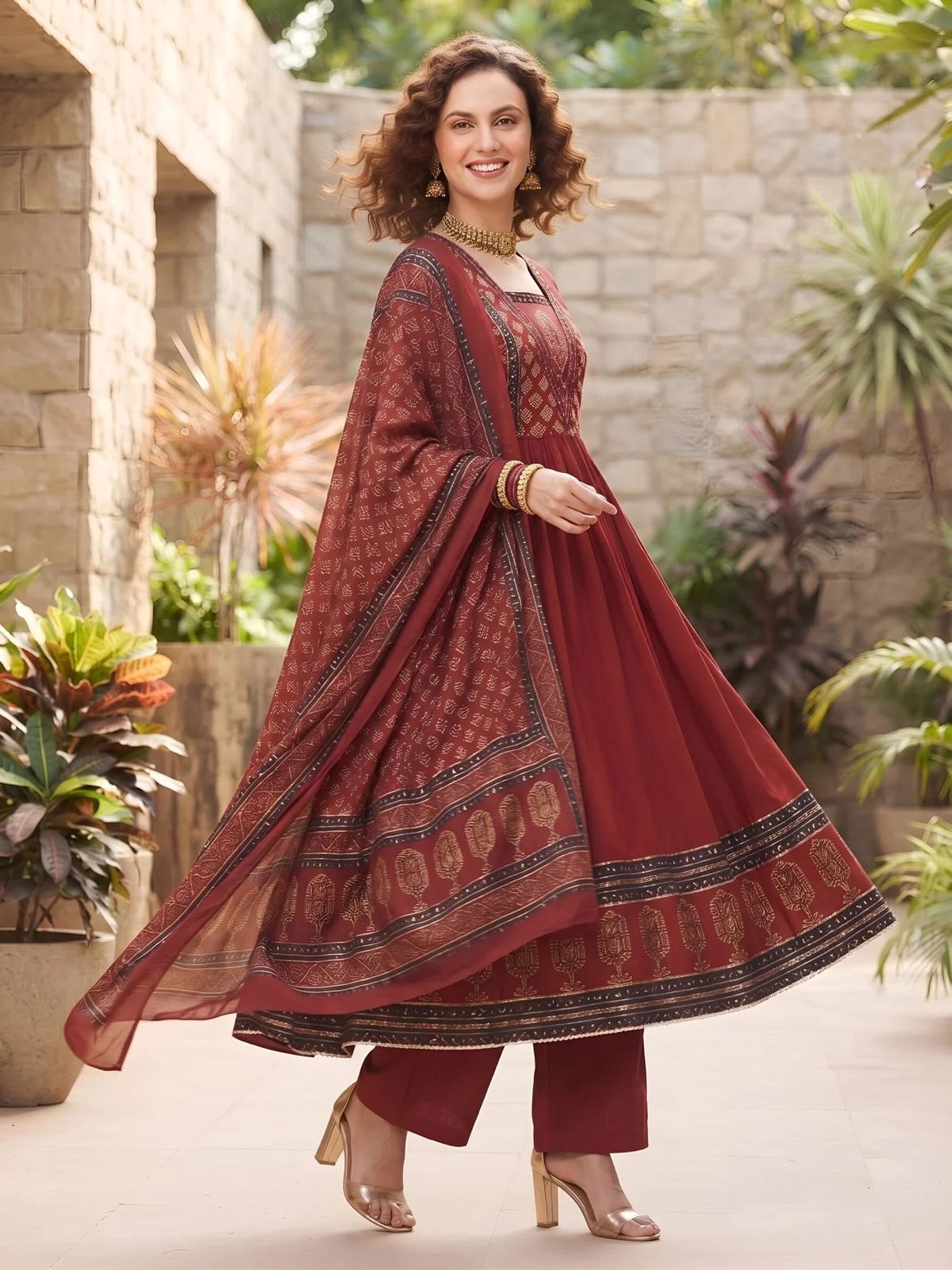 Maroon pure cotton Jaipuri Anarkali kurta pants set with Bagru print dupatta, twirl view | InayaKhan