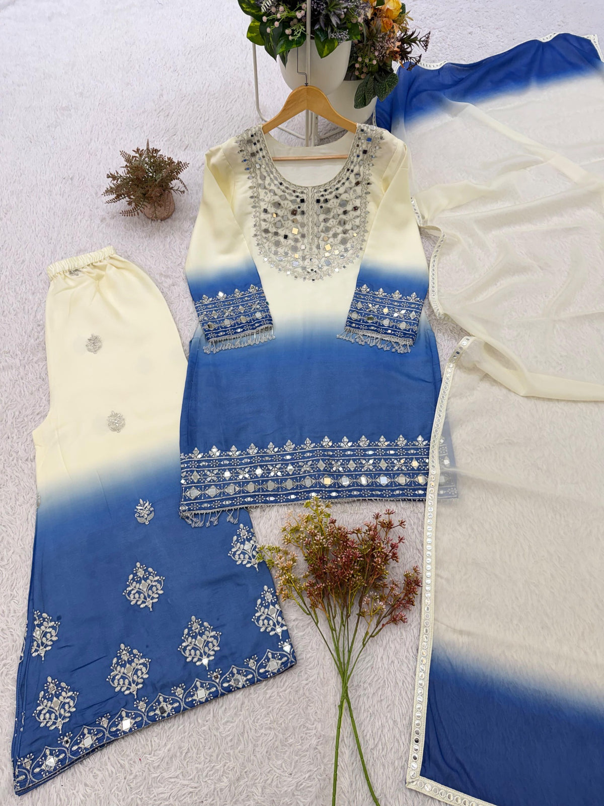 Ivory and royal blue real mirror embroidered top palazzo and dupatta flat lay