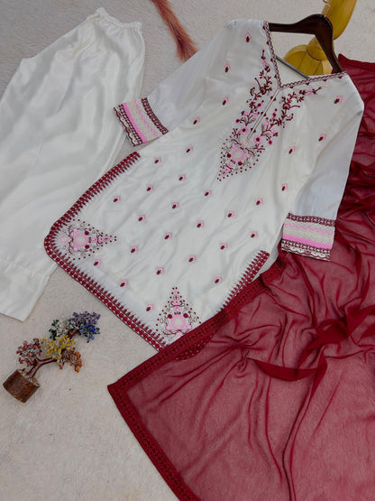 Ivory embroidered silk kurti and Farshi salwar product flat lay