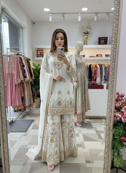 Ivory white embroidered georgette sharara suit with dupatta on model