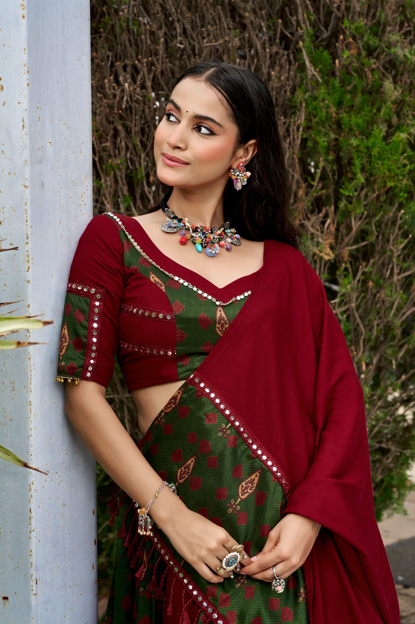 Deep maroon blouse and dupatta with olive green Ajrakh print mirror lace detail