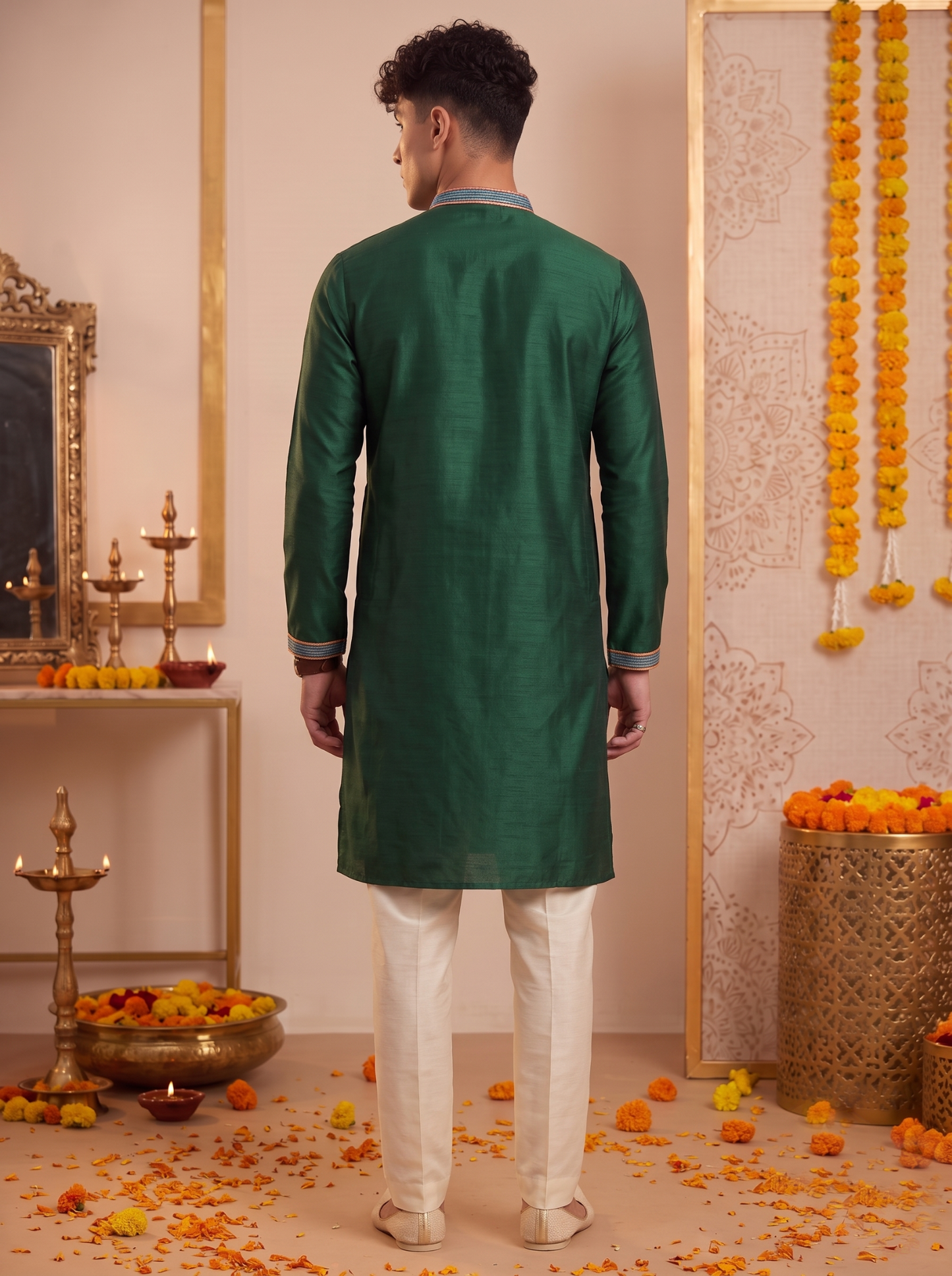 Men's emerald green silk kurta and ivory trouser set back view