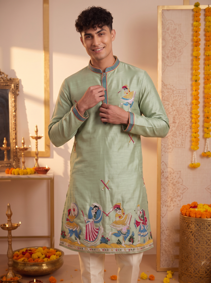 Men's sage green silk kurta with colourful folk-dance embroidery