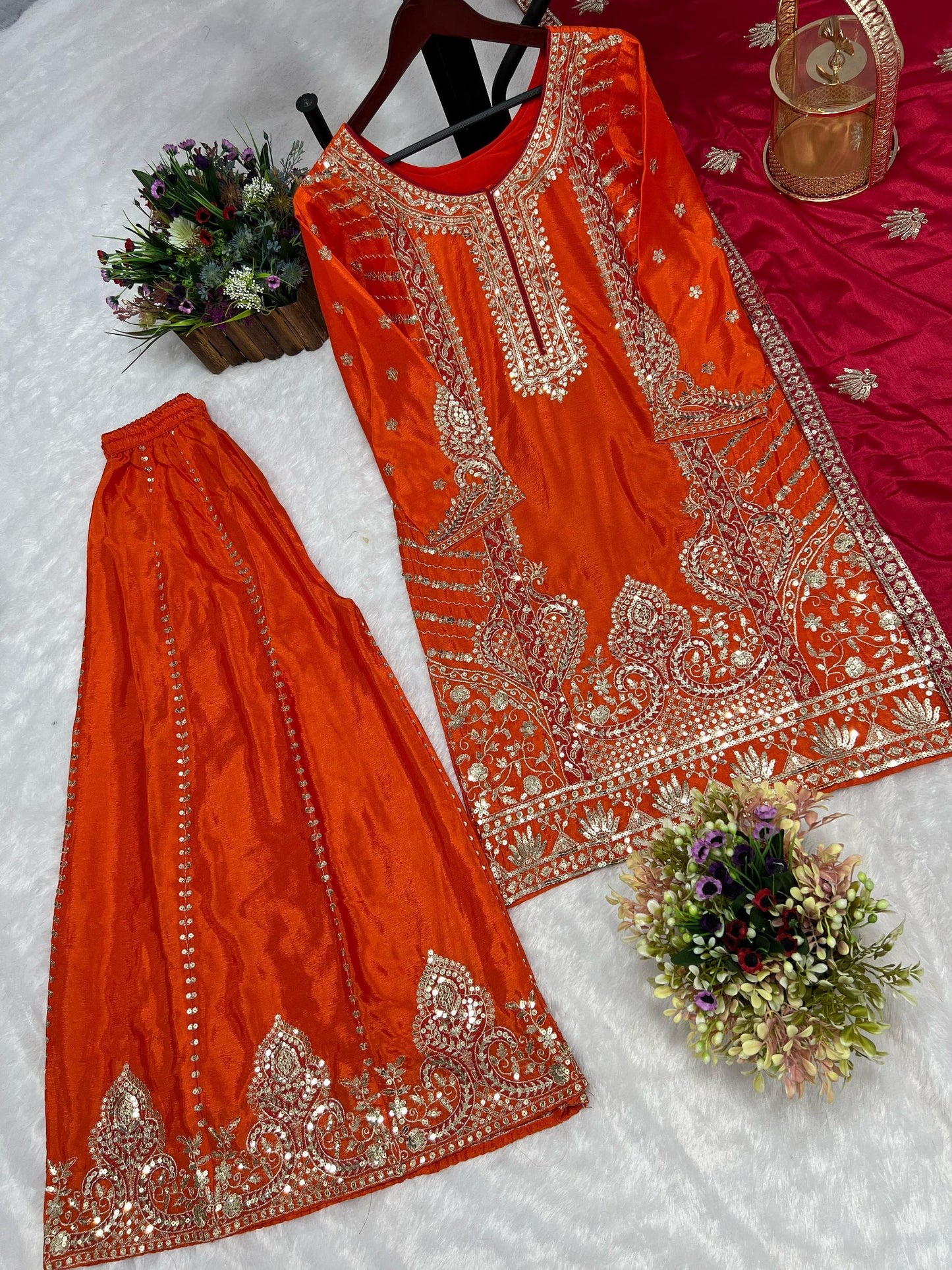 Detailed view of orange Chinon silk kurti with gold embroidery and sequin work