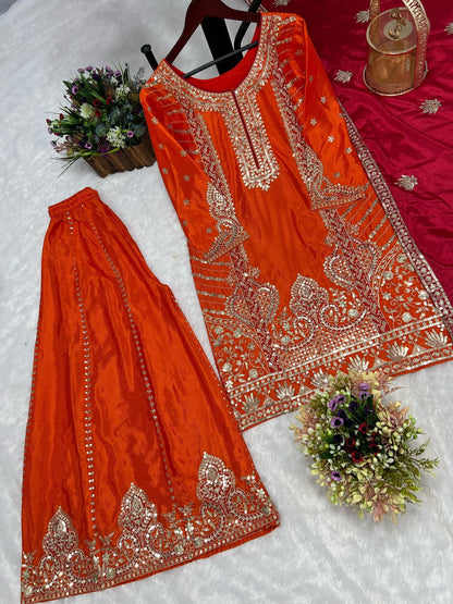 Detailed view of orange Chinon silk kurti with gold embroidery and sequin work