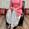 Pink Collar neck chikankari kurta teamed up with chikankari Afghani salwar
