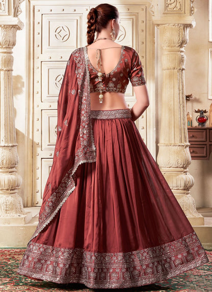 Brick Red Opulent Silk Wedding Reception Lehenga Choli with Embroidery and Sequins