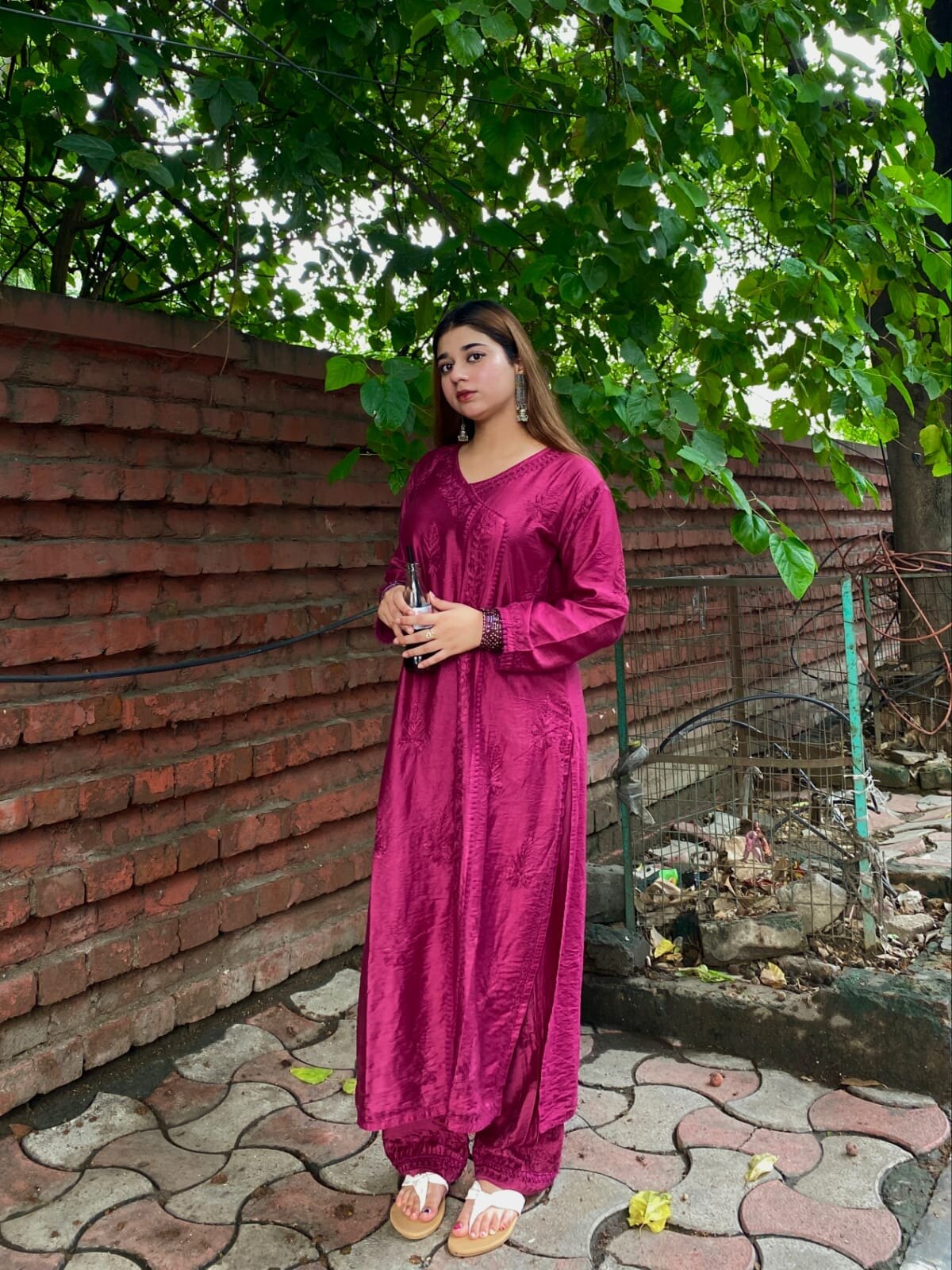 Rani pink Lucknow chikankari kurti and lace pant set full-length look