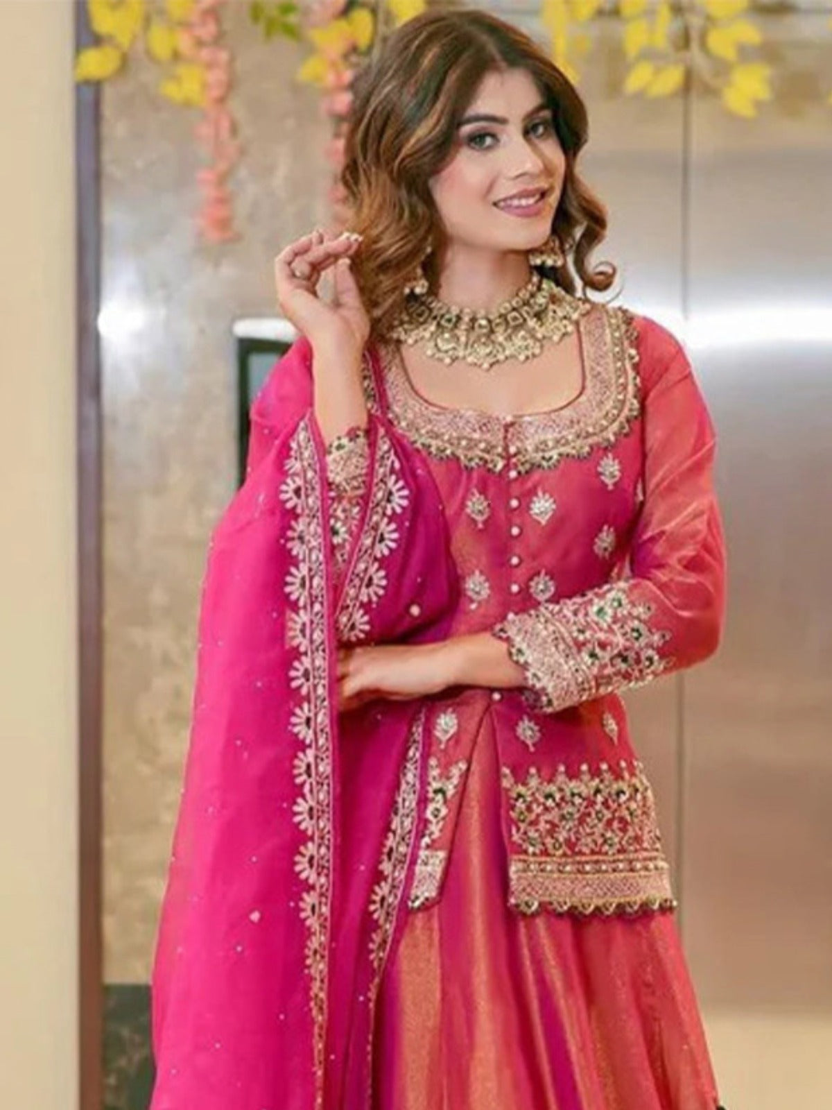 Rani pink long choli neckline and embroidery detail