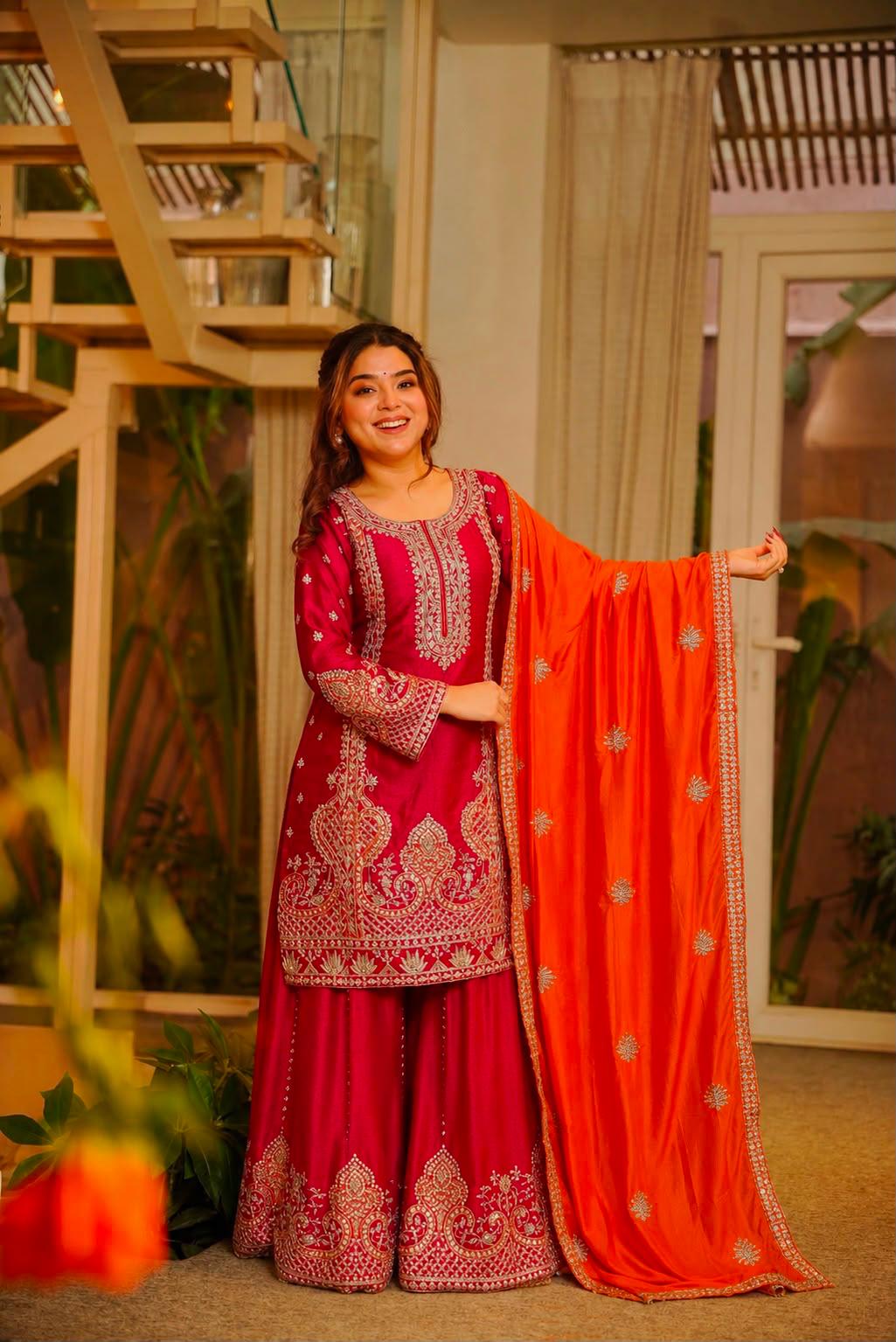 Full-length Rani pink kurti palazzo set with orange embroidered dupatta