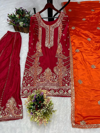 Front view of Rani pink embroidered kurti and palazzo with orange dupatta