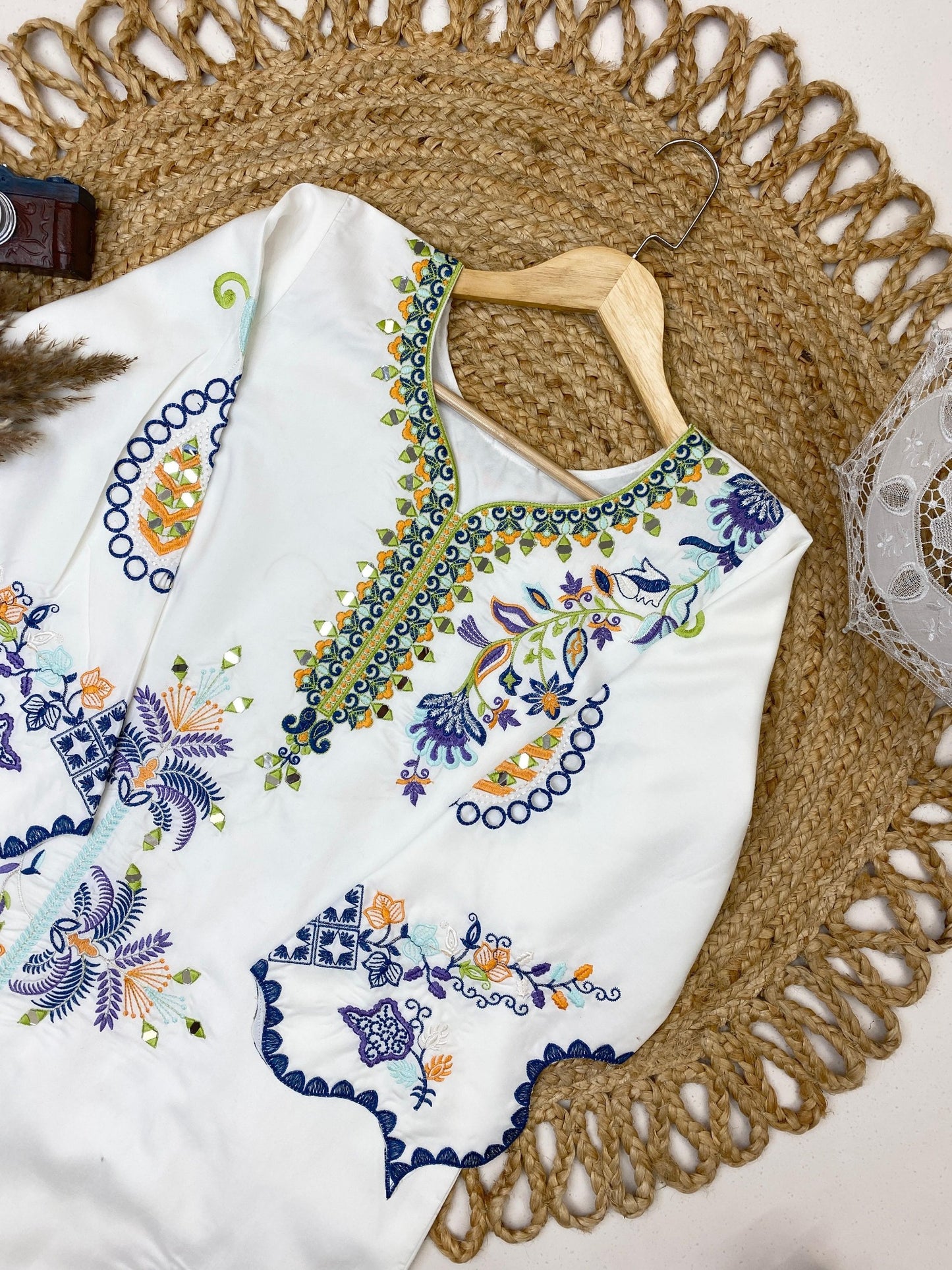 Real mirror and multicolor embroidery detail on ivory white kurti