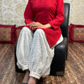 Red Collar neck chikankari kurta teamed up with chikankari Afghani salwar