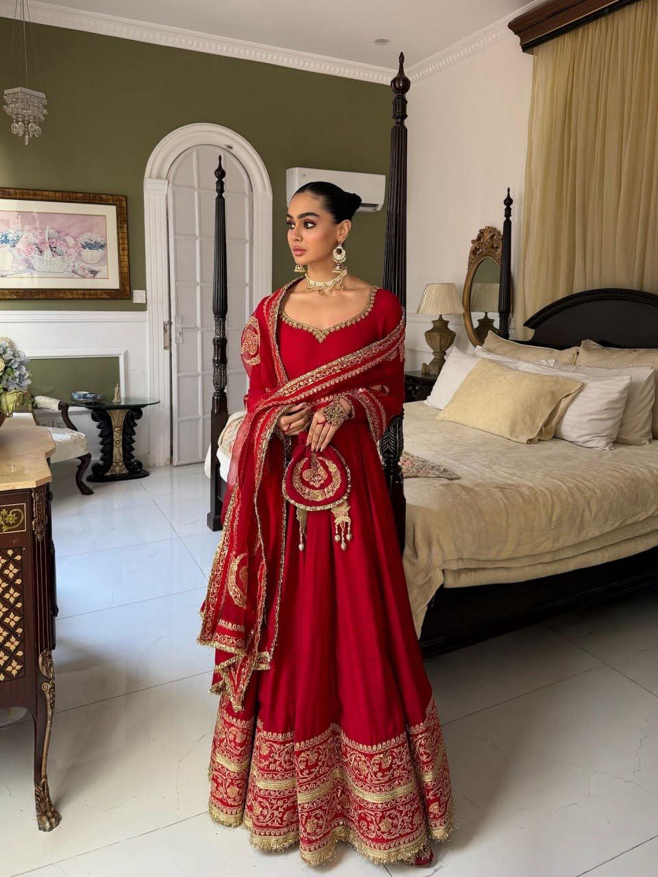 Red full-flare designer gown with embroidered dupatta model view