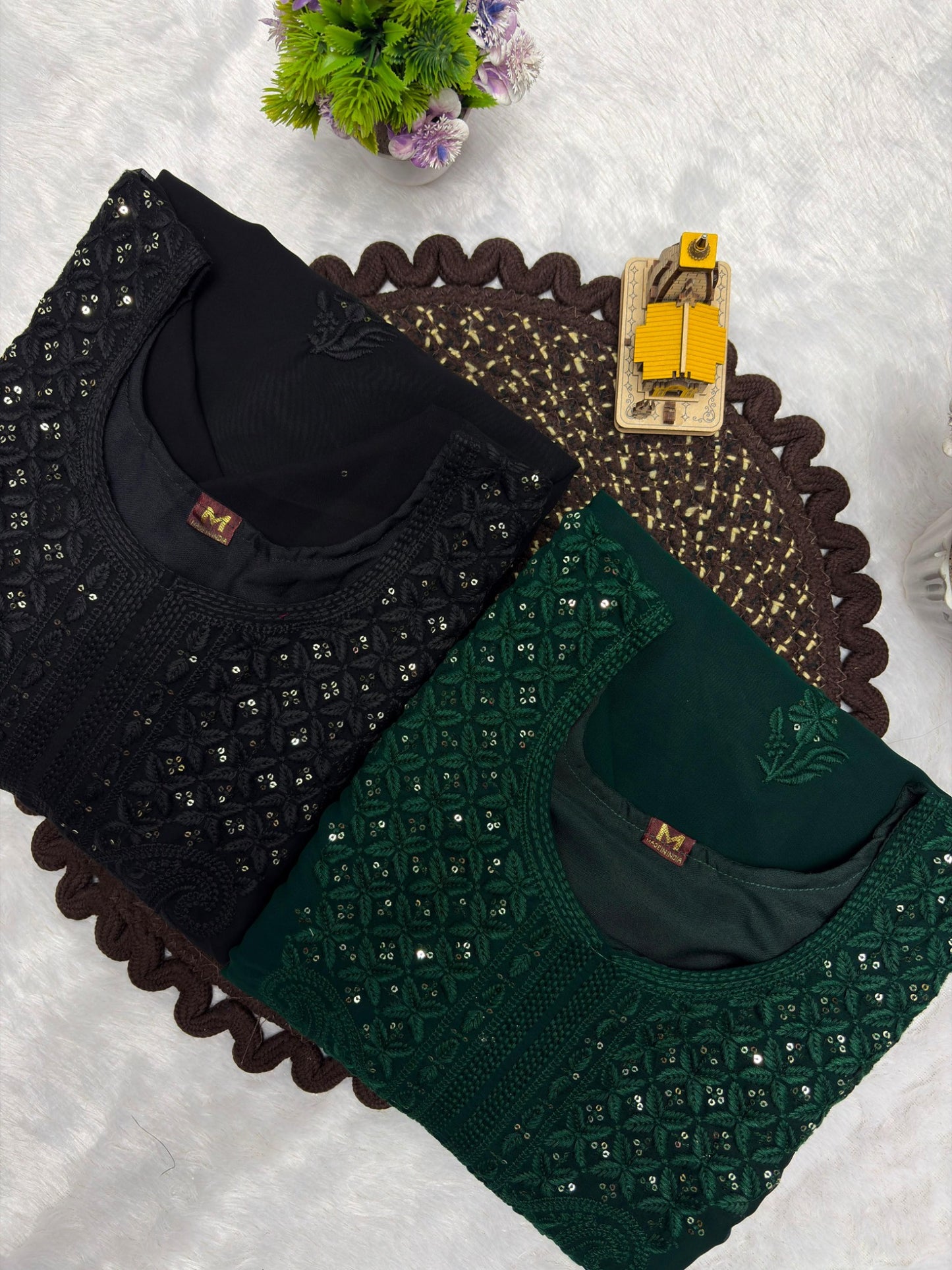 Black and dark green embroidered georgette kurta sets color comparison