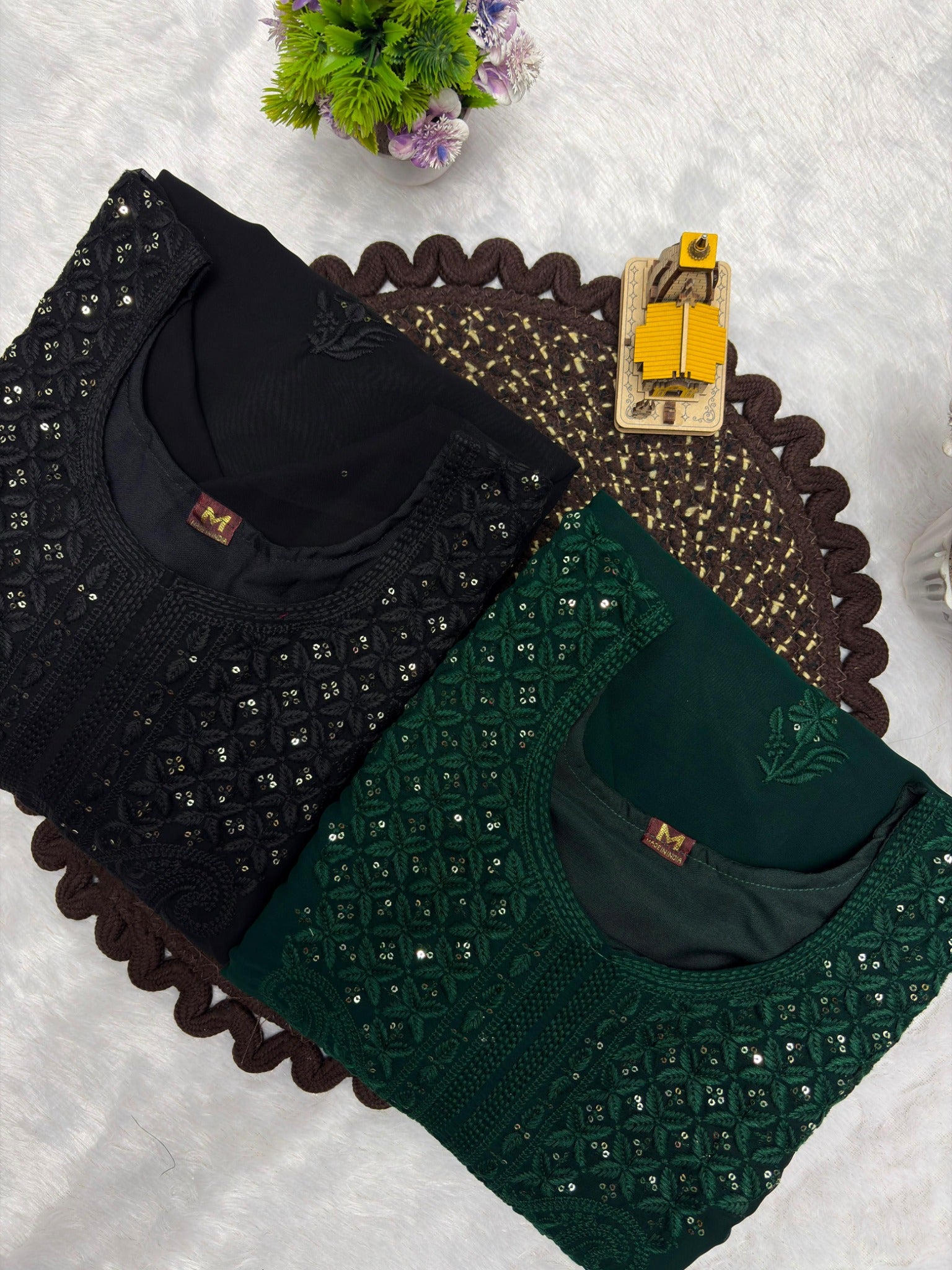 Black and dark green embroidered georgette kurta sets color comparison