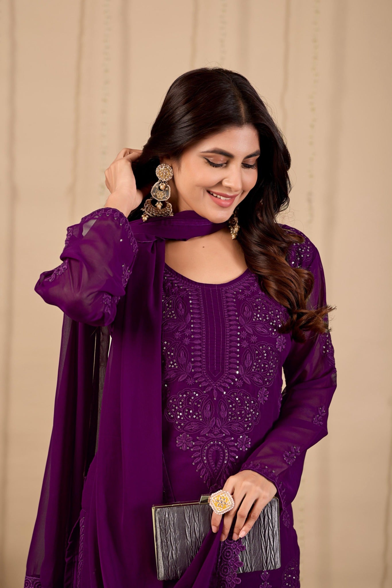 Purple embroidered georgette kurta close up modeling shot