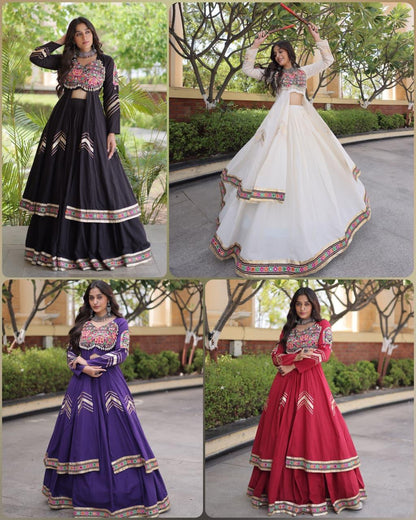 White Navratri lehenga choli with colorful Gamthi work full look