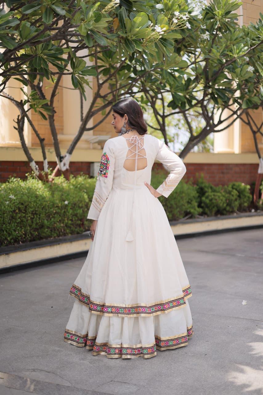White Navratri lehenga choli back design with dori tie