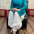 Teal Blue color Collar neck chikankari kurta teamed up with chikankari Afghani salwar