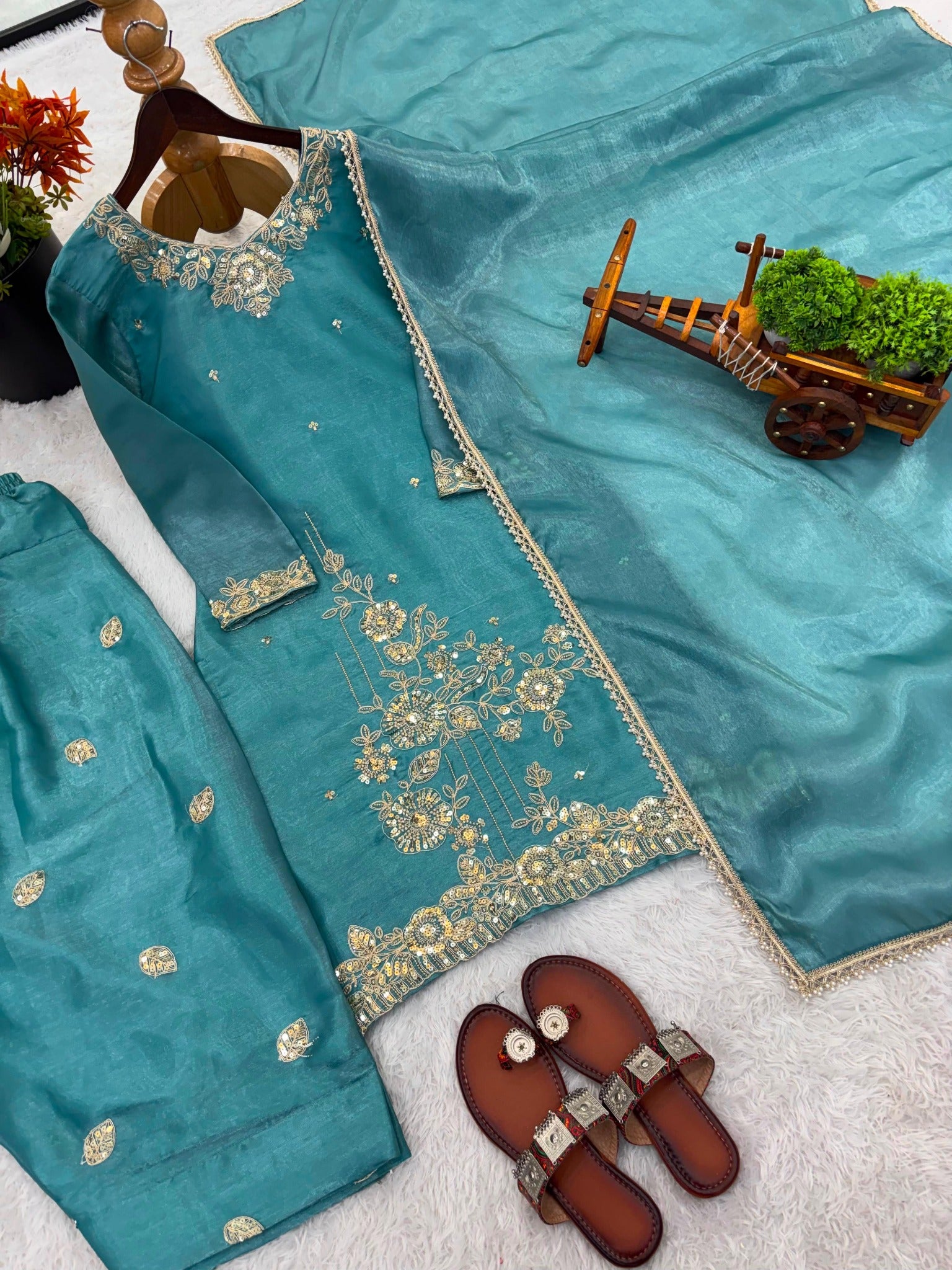 teal blue embroidered Farshi pant set flat lay