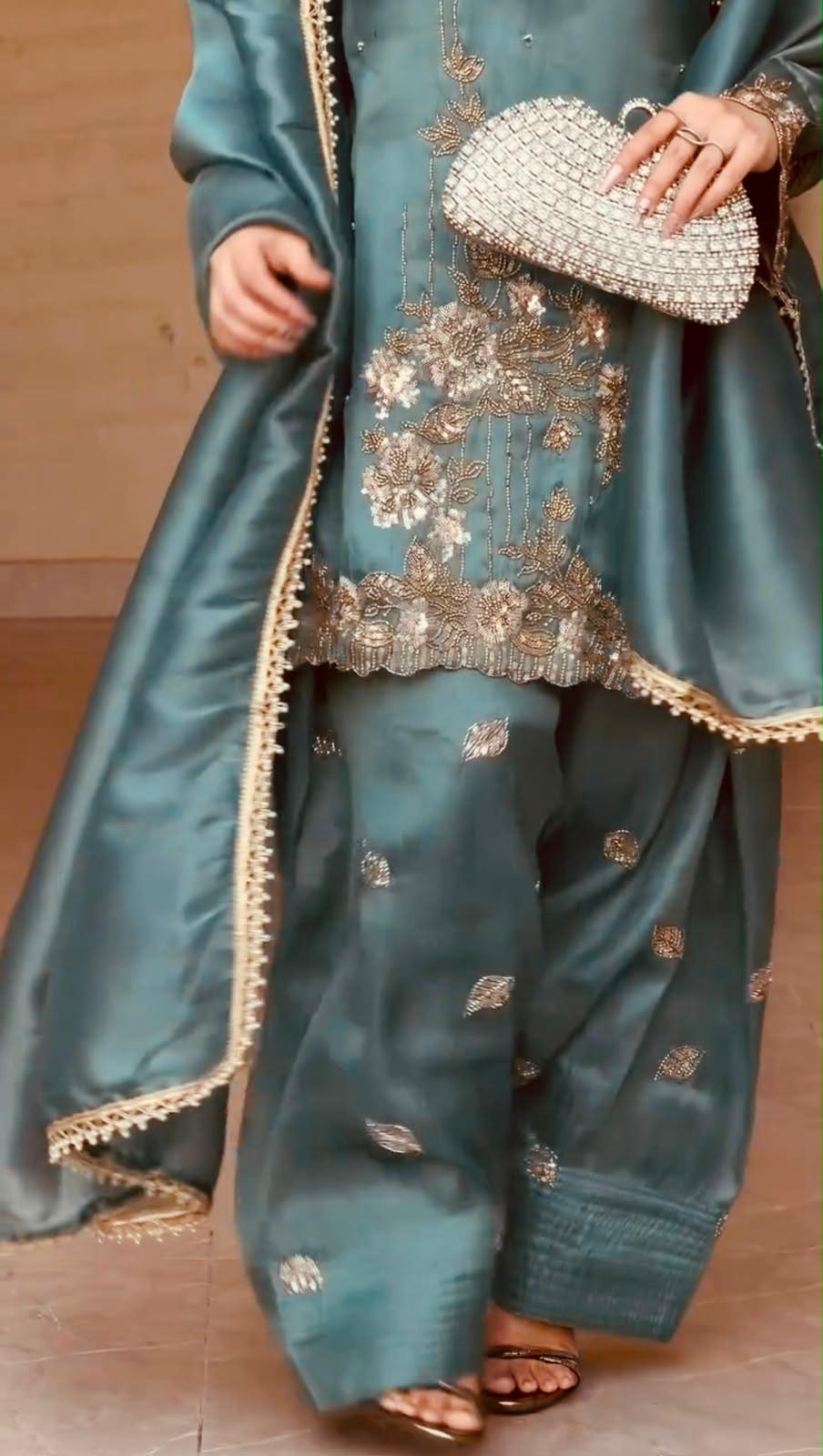 teal blue embroidered top and Farshi pant detail