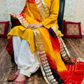 Yellow Chikankari kurta with Afghani Pant in White and Yellow Black red Bandhani Dupatta