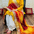 Yellow Chikankari kurta with Afghani Pant in White and Yellow Red Bandhani Dupatta